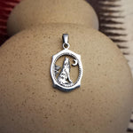 Sterling Silver Wolf Howling at the Moon Pendant – Oval Western Design