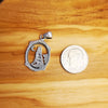 Sterling Silver Wolf Howling at the Moon Pendant – Oval Western Design