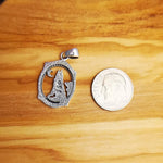 Sterling Silver Wolf Howling at the Moon Pendant – Oval Western Design