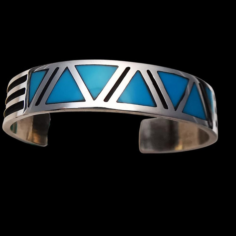 Sterling Silver Cuff Bracelet with Navajo Tribal design inlaid with Sleeping Beauty Turquoise