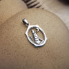 Sterling Silver Wolf Howling at the Moon Pendant – Oval Western Design