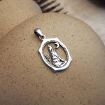 Sterling Silver Wolf Howling at the Moon Pendant – Oval Western Design
