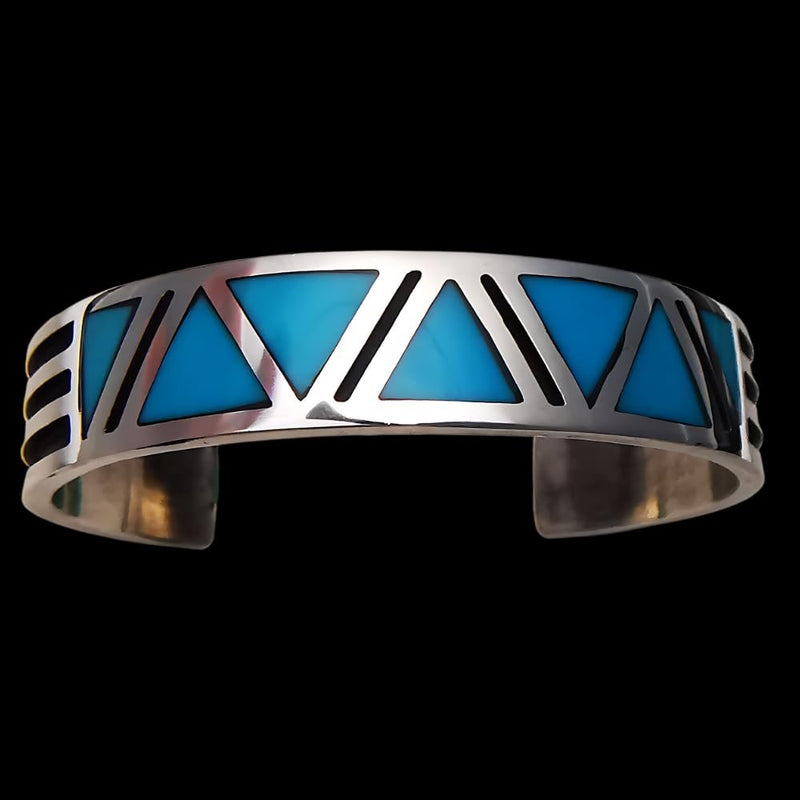 Sterling Silver Cuff Bracelet with Navajo Tribal design inlaid with Sleeping Beauty Turquoise