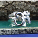 Wide band sterling silver ring with OM design in sizes 6, 7, 8, 9, 10