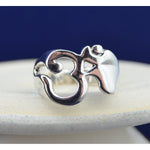 Wide band sterling silver ring with OM design in sizes 6, 7, 8, 9, 10