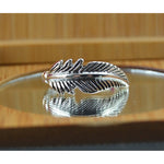 Sterling silver feather band ring in sizes 6, 7, 8, 9