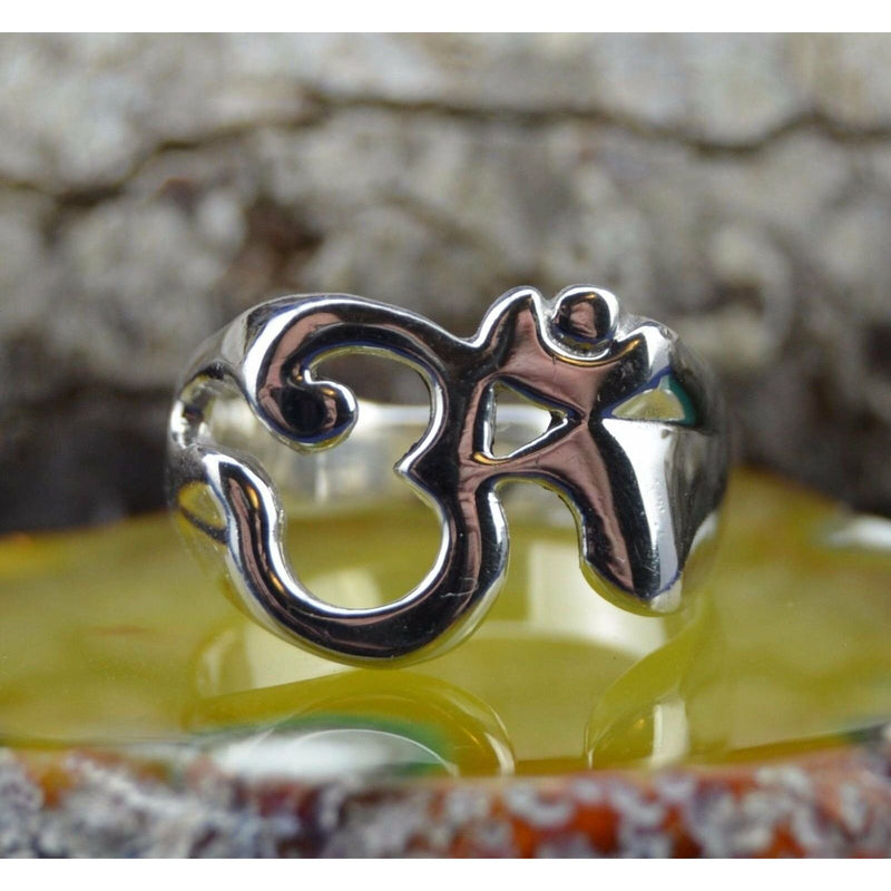 Wide band sterling silver ring with OM design in sizes 6, 7, 8, 9, 10